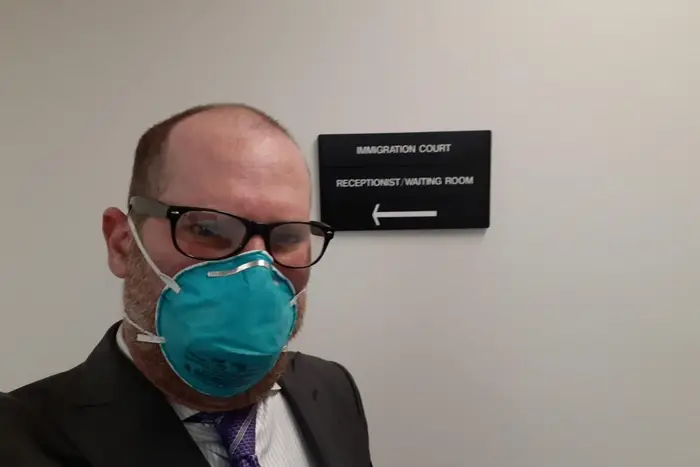Attorney Joshua Bardavid wears a protective face mask at the Varick Street immigration court.